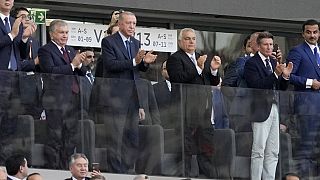 Hungarian Prime Minister Viktor Orbán (r) and Turkish President Recep Tayyip Erdogan,  applaud while attending the World Athletics Championships in Budapest, Hungary.