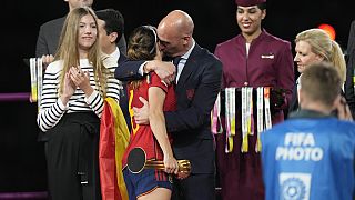 Luis Rubials kisses Spanish football player Jennifer Hermoso after the team's World Cup victory