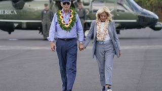 President Joe Biden and first lady Jill Biden walk to board Air Force One after visiting the site of the devastating Maui wildfires and the ongoing recovery efforts, 21.08.23