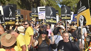 Protesters attend the Day of Solidarity union rally on Tuesday, Aug. 22, 2023, at Disney Studios in Burbank, Calif.