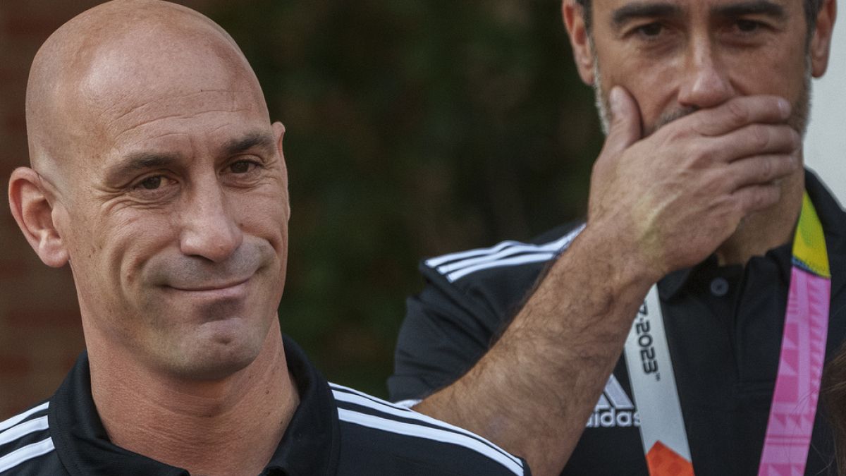 President of Spain's soccer federation, Luis Rubiales, left, stands next to Spain Head Coach Jorge Vilda after their World Cup victory at La Moncloa Palace in Madrid.