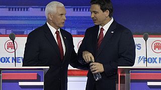 Republican primary candidates Mike Pence and Ron DeSantis at the first televised debate in Milwaukee, Wisconsin, on 23 August 2023.