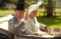Britain's King Charles III and Camilla, the Queen Consort arrive in a carriage for Ladies Day of the Royal Ascot horse racing meeting, at Ascot Racecourse in Ascot, England.