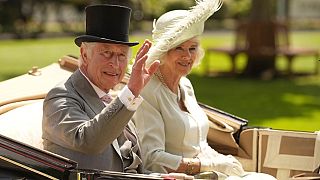 Britain's King Charles III and Camilla, the Queen Consort arrive in a carriage for Ladies Day of the Royal Ascot horse racing meeting, at Ascot Racecourse in Ascot, England.