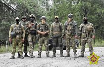 FILE - members of Wagner and Belarusian special forces train together, July 2023.
