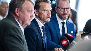 From left, Foreign Affairs minister Lars Loekke Rasmussen,  Justice Minister Peter Hummelgaard and Deputy Prime Minister Jakob Ellemann-Jensen present the bill. Aug 25, 2023