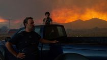 Local residents watch the wildfire in Avantas village, near Alexandroupolis town, in the northeastern Evros region, Greece.