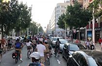 FILE - Cyclists hold a protest in Elche against a bike lane closure proposal