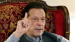 Pakistan's former Prime Minister Imran Khan gestures during talk with reporters