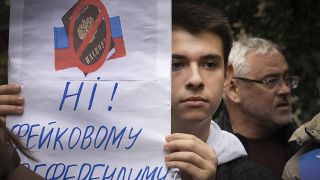 Участник акции протеста против референдума, организованного Кремлем, Киев, сентябрь 2022 г.