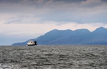 People travel by Caledonian MacBrayne ferry from Mallaig in the Scottish Highlands