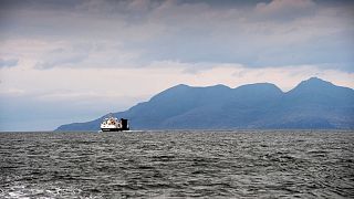 People travel by Caledonian MacBrayne ferry from Mallaig in the Scottish Highlands
