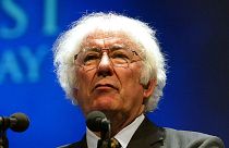 Irish poet Seamus Heaney speaks in Waterfront Hall, Belfast, Northern Ireland, on Jan. 27, 2004.