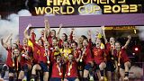 Team Spain celebrates with the trophy after winning the Women's World Cup soccer final against England at Stadium Australia in Sydney, Australia, Aug. 20, 2023.