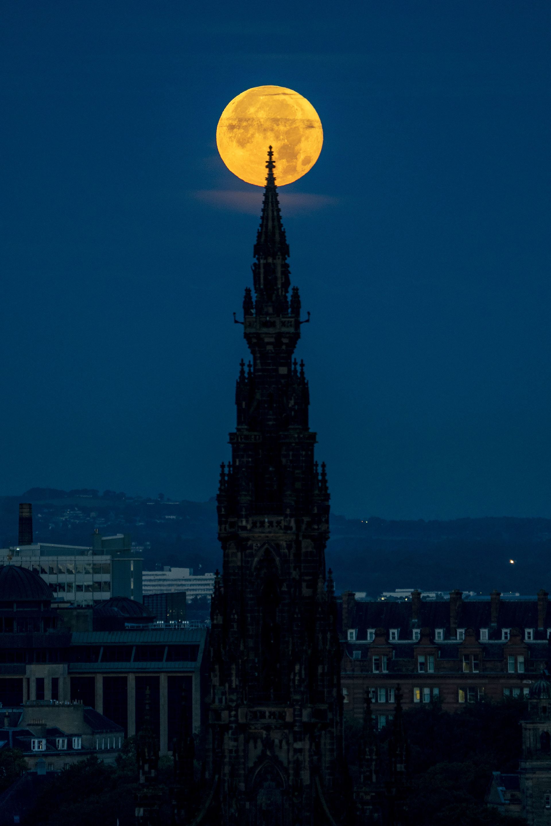 In pictures: Rare Super Blue Moon dazzles stargazers in the skies over ...