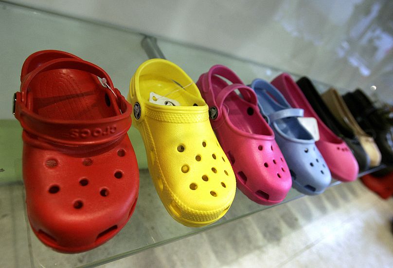 A sample of Crocs shoes on display in a midtown New York City shoe store 21 February 2007. Crocs is an American company.