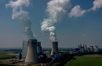 Steam rises from the coal-fired power plant in Neurath, Germany, Thursday, June 8, 2023.