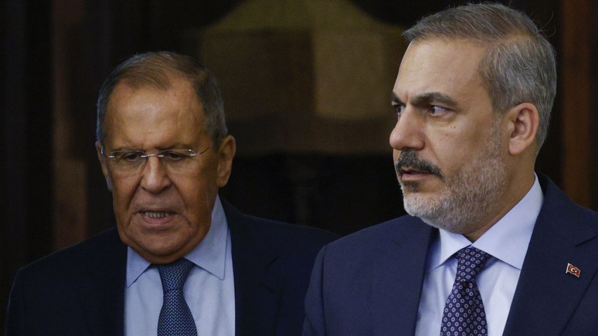 Russian Foreign Minister Sergey Lavrov, left, and Turkish Foreign Minister Hakan Fidan arrive to hold a press conference in Moscow, Russia, Thursday, Aug. 31, 2023