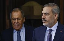 Russian Foreign Minister Sergey Lavrov, left, and Turkish Foreign Minister Hakan Fidan arrive to hold a press conference in Moscow, Russia, Thursday, Aug. 31, 2023