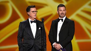 Stephen Colbert, left, and Jimmy Kimmel