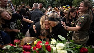 Relatives bid their last farewell to the fallen Ukrainian pilots and crew members of mi-8 military helicopters of the 18 aviation brigade in Poltava