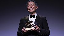 Tony Leung Chiu-wai receives the Golden Lion for Lifetime Achievement award during the 80th edition of the Venice Film Festival in Venice, Italy, on Saturday, Sept. 2, 2023.