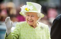 Queen Elizabeth II waves during a walk about around Windsor on her 90th Birthday in 2016