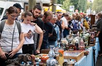 People look at items on sale during the annual Braderie de Lille (Lille Fleamarket), in Lille, northern France, on September 2, 2023.