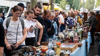 People look at items on sale during the annual Braderie de Lille (Lille Fleamarket), in Lille, northern France, on September 2, 2023.