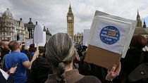 Demonstrators gather in Parliament Square before a group of EU citizens of several nationalities protest over their right to remain in the UK in 2017, the year after the vote