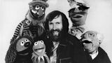 Jim Henson, creator of the Muppet Show, poses in September 1977 with some of the characters he personally operated