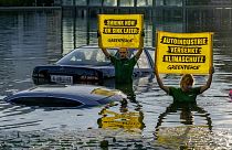 Activists of environmental organisation Greenpeace have drowned cars in a small lake at the first day of the IAA Mobility car showin Munich, Germany, Monday, Sept. 4, 2023.