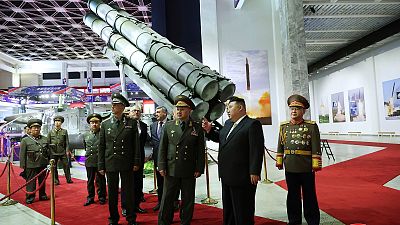 FILE: North Korean leader Kim Jong Un, second right, and Russian Defense Minister Sergei Shoigu, third right, visit an arms exhibition in Pyongyang, North Korea 26 July 2023