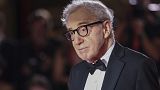 Director Woody Allen poses for photographers upon arrival for the premiere of the film 'Coup de Chance' during the 80th edition of the Venice Film Festival in Venice, Italy.