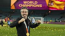 Spain's head coach Jorge Vilda celebrates with the gold medal after the final of Women's World Cup soccer between Spain and England at Stadium Australia in Sydney, 2023.