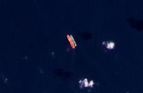 In this satellite photo provided by Planet Labs PBC, vessels identified as the Virgo, left, and the Suez Rajan, by the advocacy group United Against Nuclear Iran, are seen in 