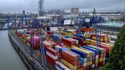 Containers are pictured in the harbor in Frankfurt, Germany, Friday, July 28, 2023. 