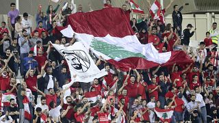 المشجعون اللبنانيون يهتفون لفريقهم خلال مجموعة كأس آسيا 2019