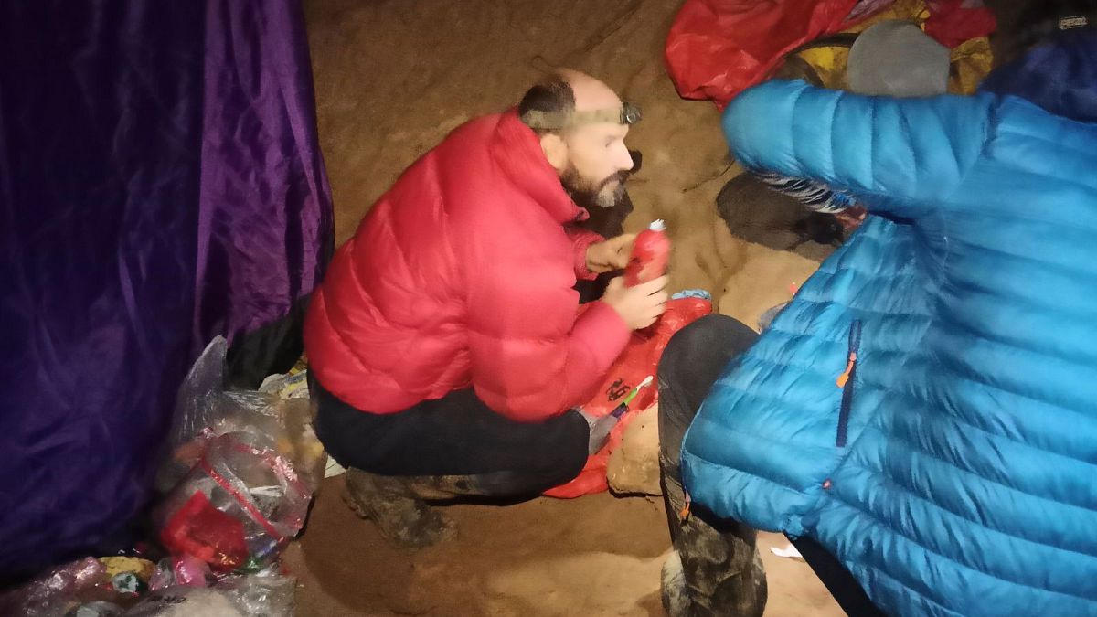 American caver Mark Dickey talks to a colleague inside the Morca cave near Anamur, southern Turkey