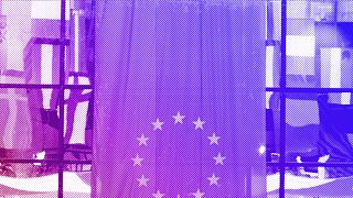 EU national flags are reflected in a window at the EU Council building in Brussels, June 2008