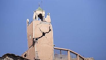 A cracked mosque minaret stands after an earthquake in Moulay Brahim village, near Marrakech, Morocco, Saturday, Sept. 9, 2023. 