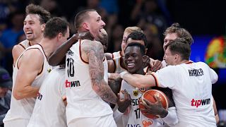 Germany celebrates after winning the championship game of the Basketball World Cup against Serbia in Manila, Philippines, Sunday, Sept. 10, 2023. (AP Photo/Michael Conroy)