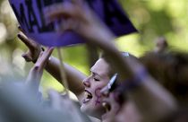 Demonstrators hold placards and shout slogans during a protest in Madrid AGAINST "La Manada"