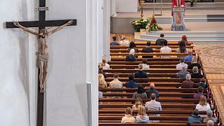 Faithful attend the Sunday Mass in Einsiedeln, Switzerland