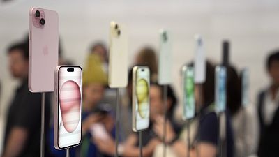 iPhone 15 and 15 Plus models are displayed during an announcement of new products on the Apple campus Tuesday, September 12, 2023