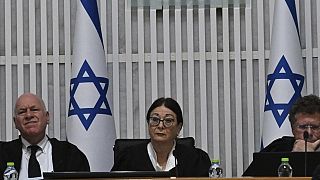 Esther Hayut, chief justice of the Supreme Court of Israel, centre, with justices Uzi Vogelman, left, and Issac Amit, right, during a Supreme Court session, Tue, Sep 12, 2023