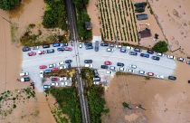 An aerial view of cars stuck on a bridge surrounded by flood waters, as storm Daniel hits central Greece, in the village of Flamouli, near Trikala, Greece, 7 September 2023. 