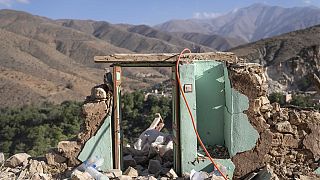 The door of what used to be a home stands amidst rubble which was caused by the earthquake, in the town of Imi N'tala, outside Marrakech, Morocco, Wednesday, Sept. 13, 2023