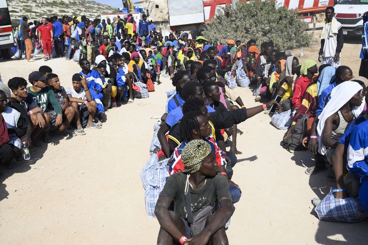 Italy: Lampedusa reels after thousands of migrants arrived in 24 hours ...