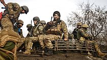 Ukrainian servicemen take positions on the frontline at an undisclosed location in the Donetsk region, Ukraine, Friday, Nov. 24, 2022.